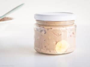 Overnight oats mixture transferred to a jar.