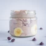 Oatmeal in a jar with banana slices.