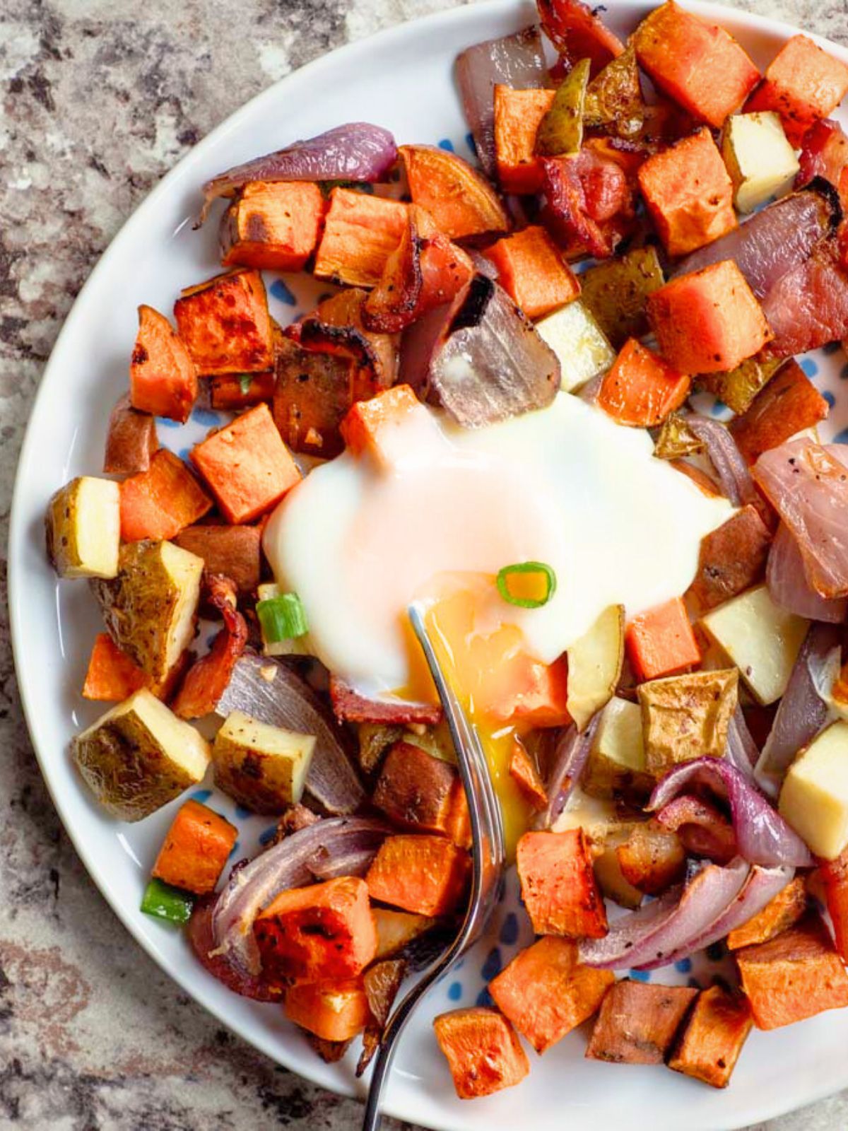 Eggs cooked with roasted vegetables.