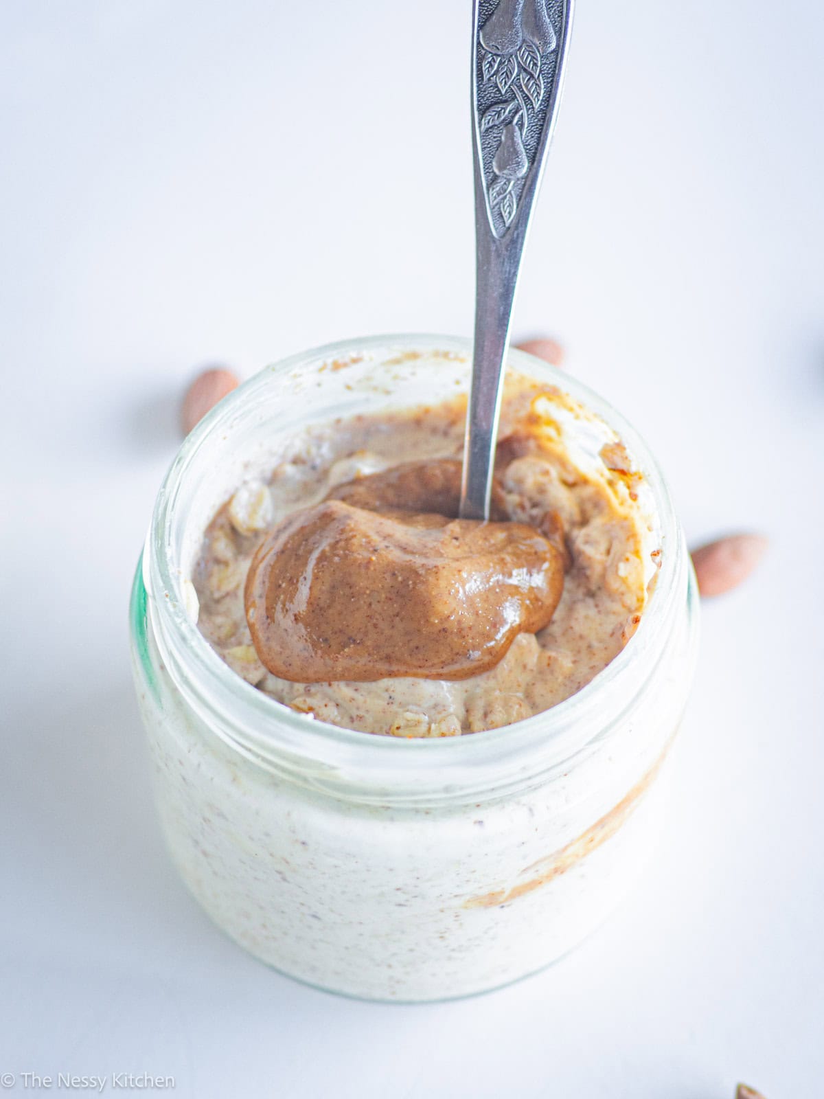 Almond butter overnight oats in a jar.