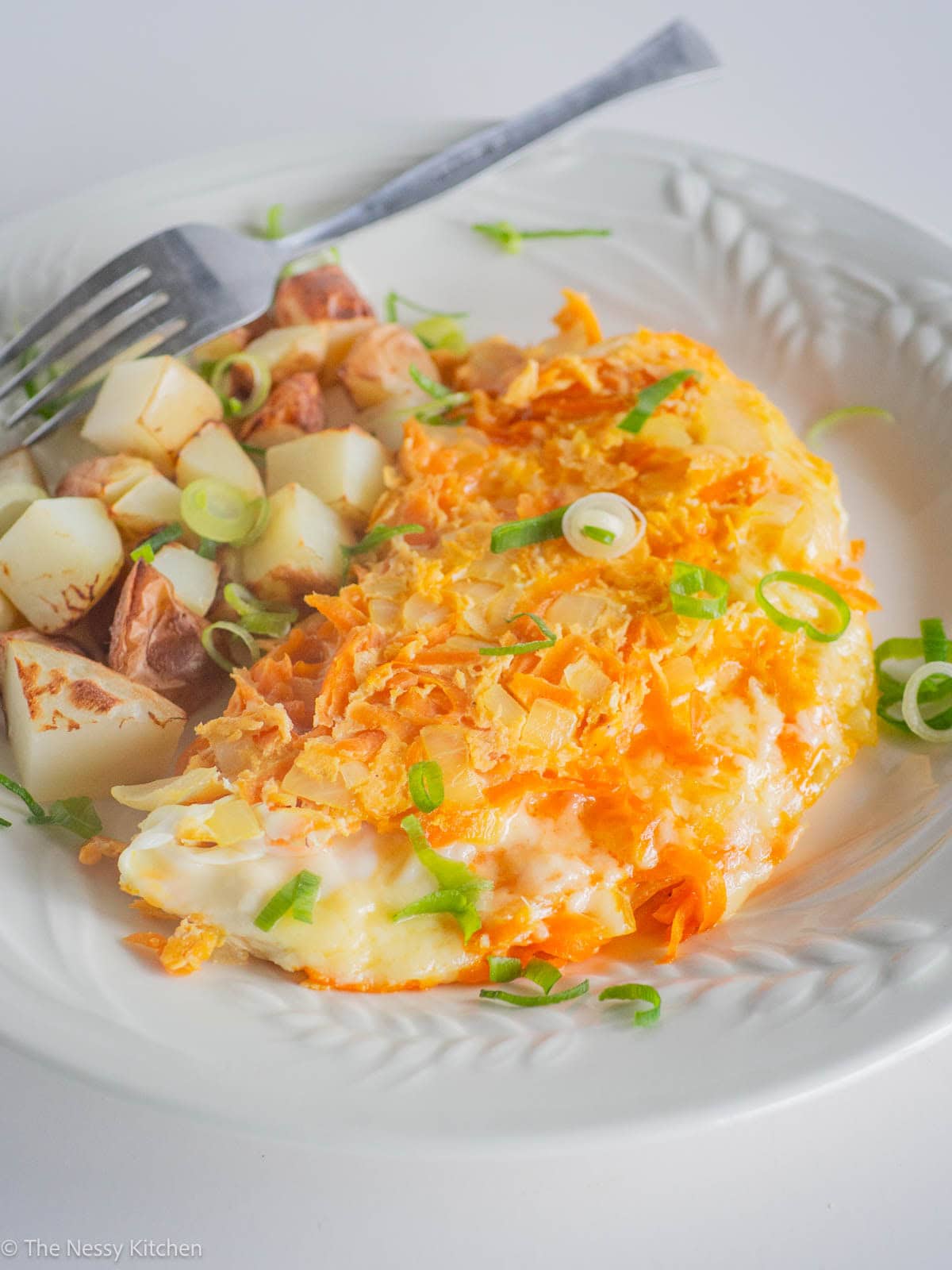 Breakfast food on a plate.