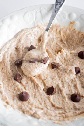 Spoon in a bowl of yogurt.