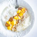 Yogurt topped with mango.
