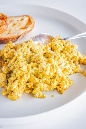Breakfast foods on a plate.
