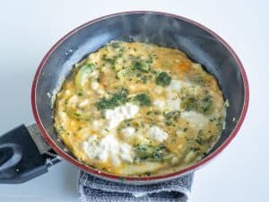 Cottage cheese dolloped into the centre of an omelet.