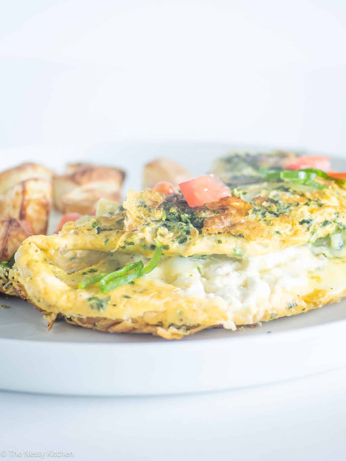 Cottage cheese melted in the centre of an omelet.