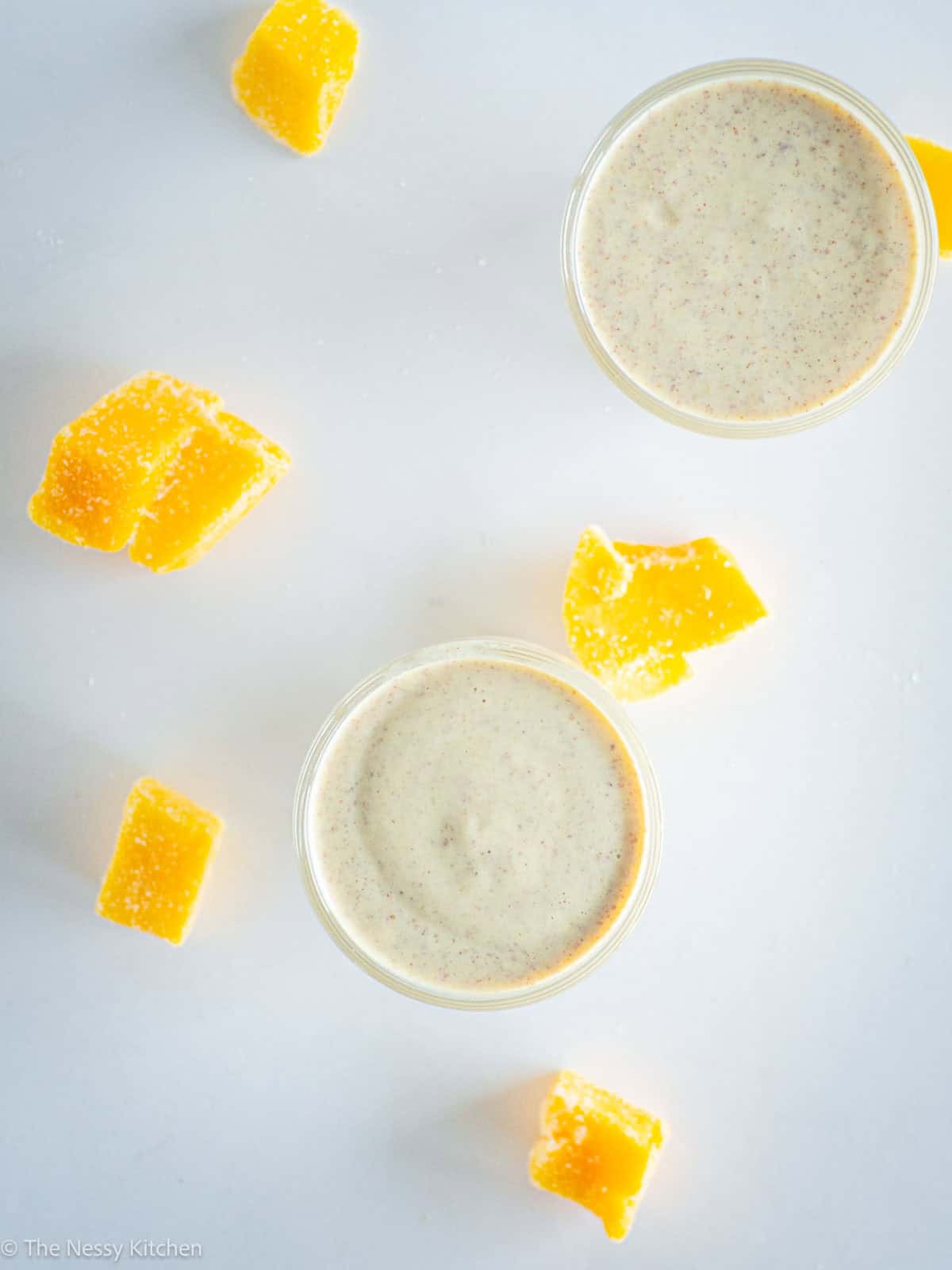 Top view of two glasses filled with smoothie.