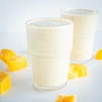 Mango smoothie in a glass.