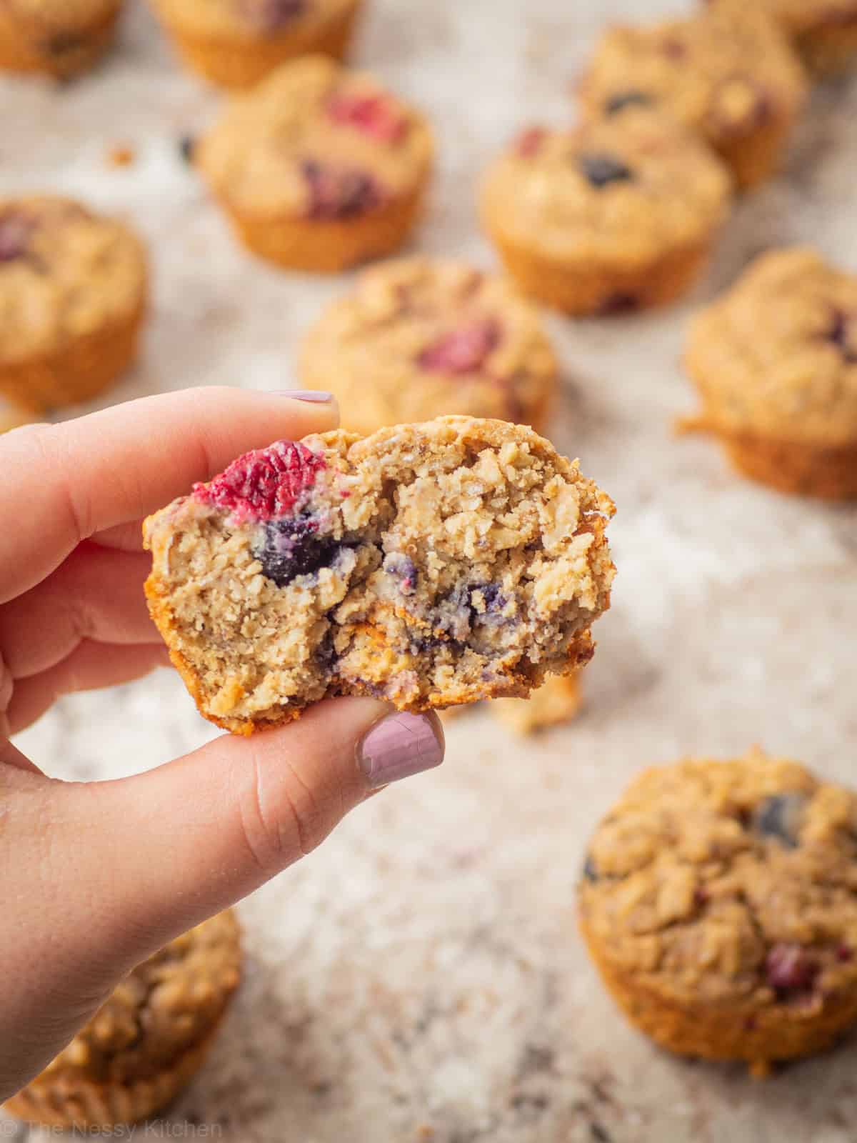 Hand holding an oatmeal cup.