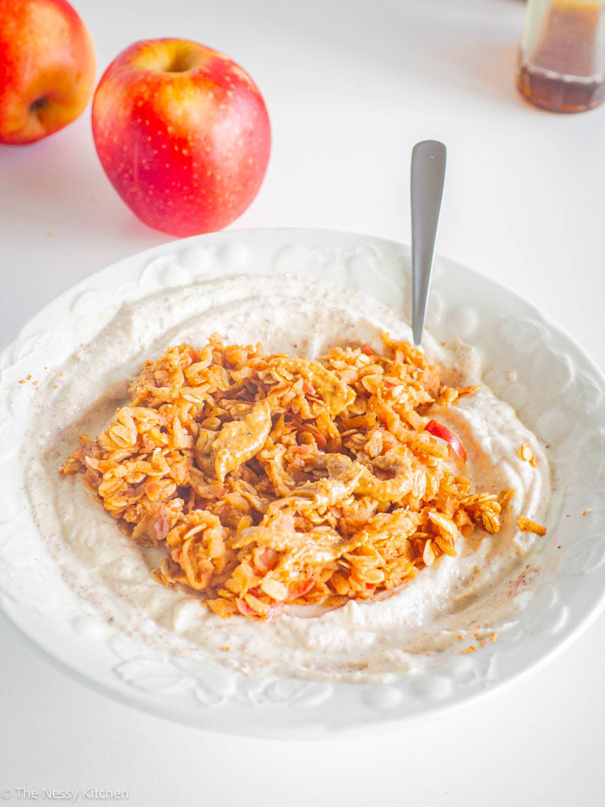 Apple yogurt bowl with an apple.