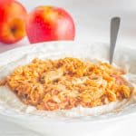 Apple topping and yogurt in a bowl.
