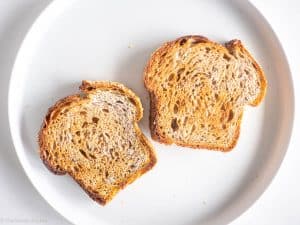 Toasted bread on plate.