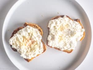 Cottage cheese and seasoning on toast.