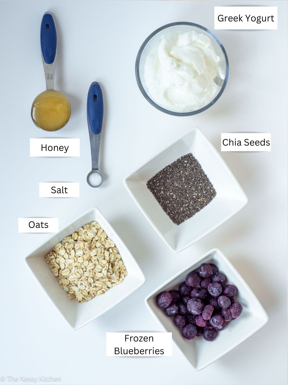 Blueberry overnight oats ingredients laid out on counter.