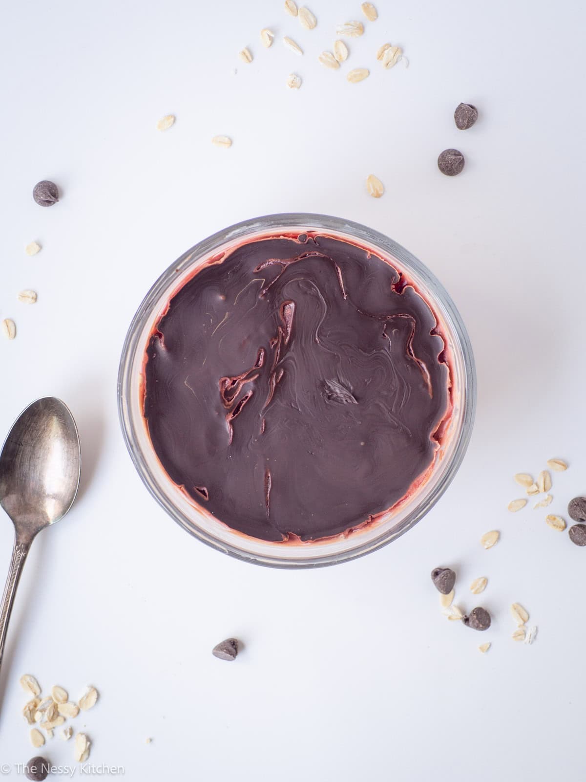 Bowl of oatmeal with a spoon.