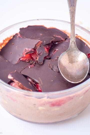 Strawberry oatmeal with chocolate topping.