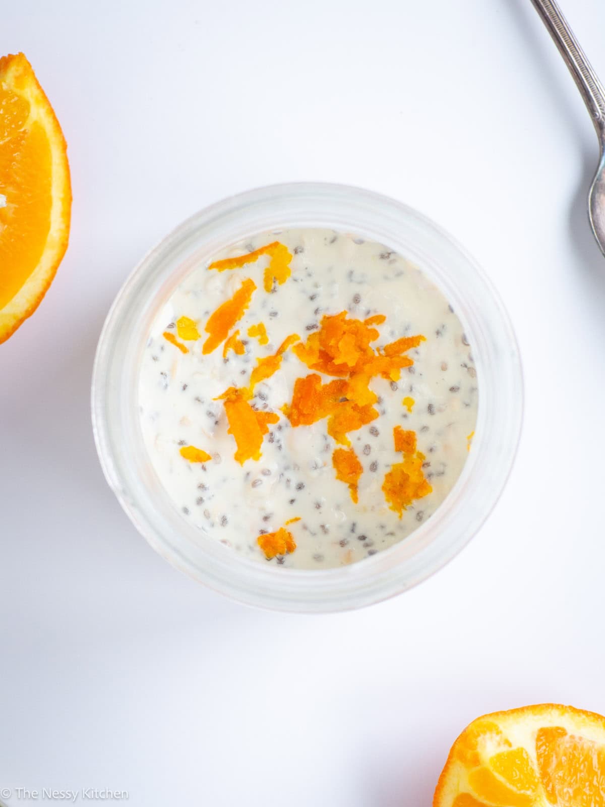 Orange overnight oats in a jar.