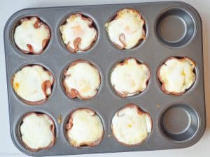 Baked egg ham cups in a muffin tin.
