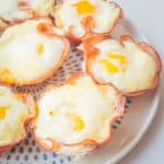 Eggs baked in sliced ham.
