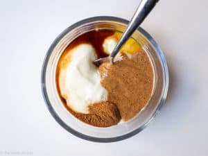 Almond butter yogurt mixture stirred together.
