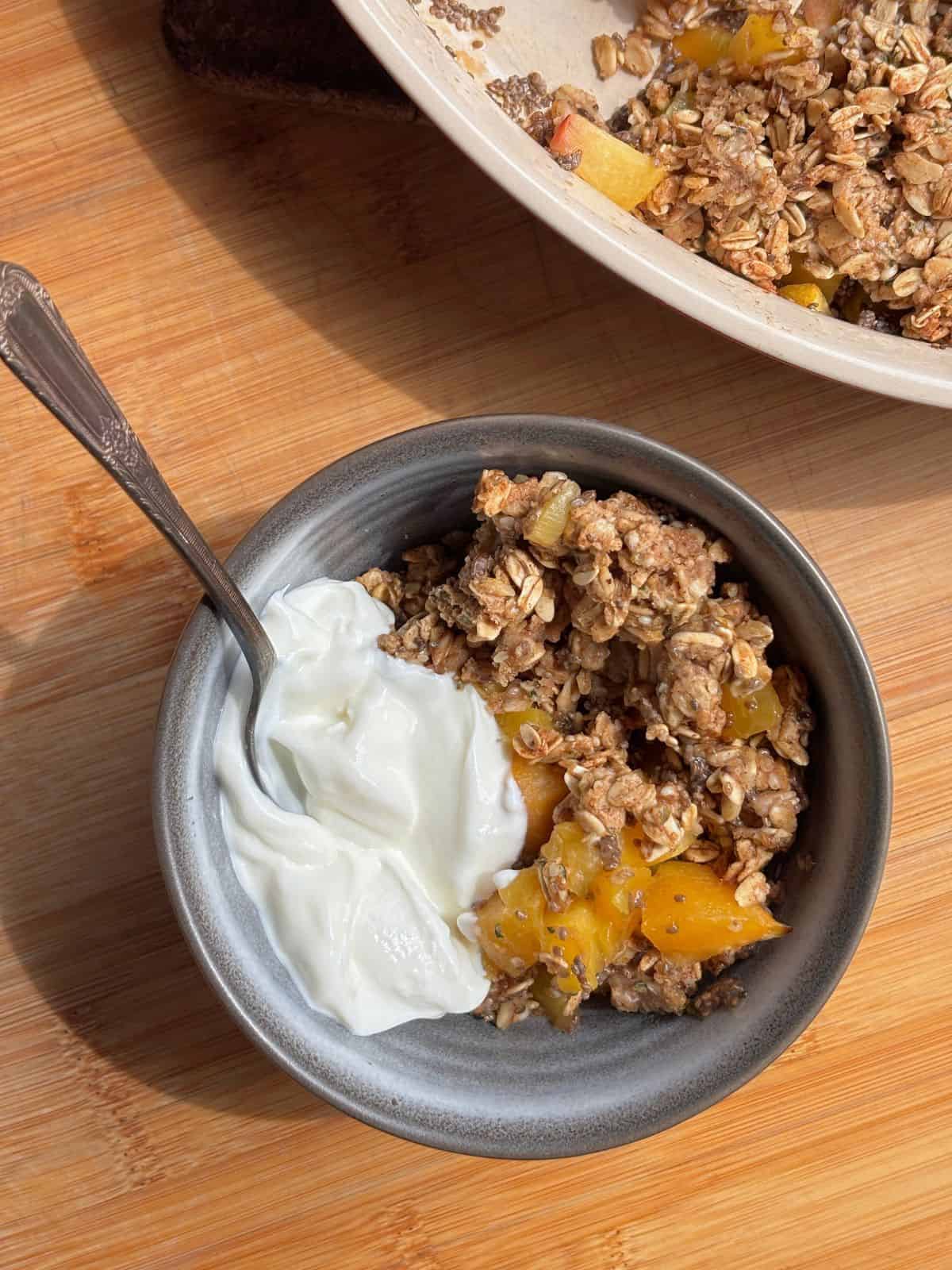 Breakfast fruit crisp in a bowl.