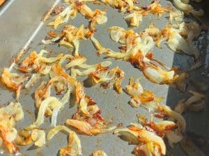 Caramelized onions in a baking pan.